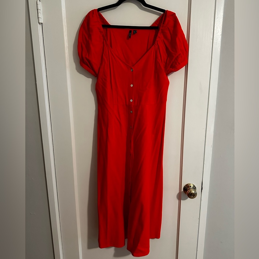 Red dress with pearlized buttons